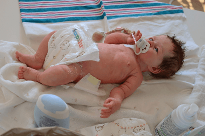 Beautiful and affordable reborn baby doll in pink dress