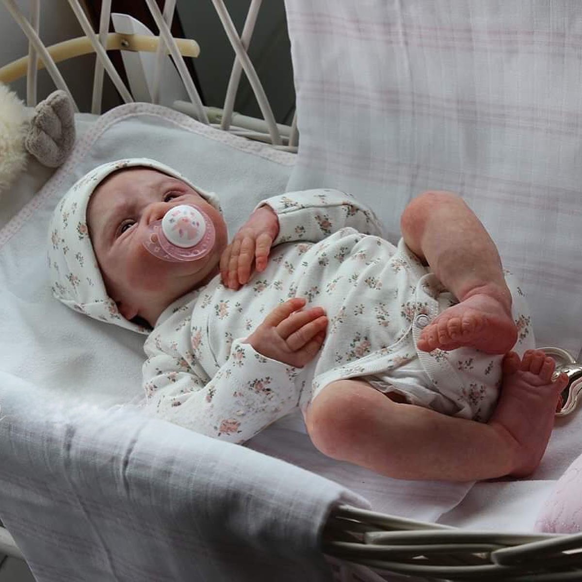 Baby June reborn doll with rooted brown mohair