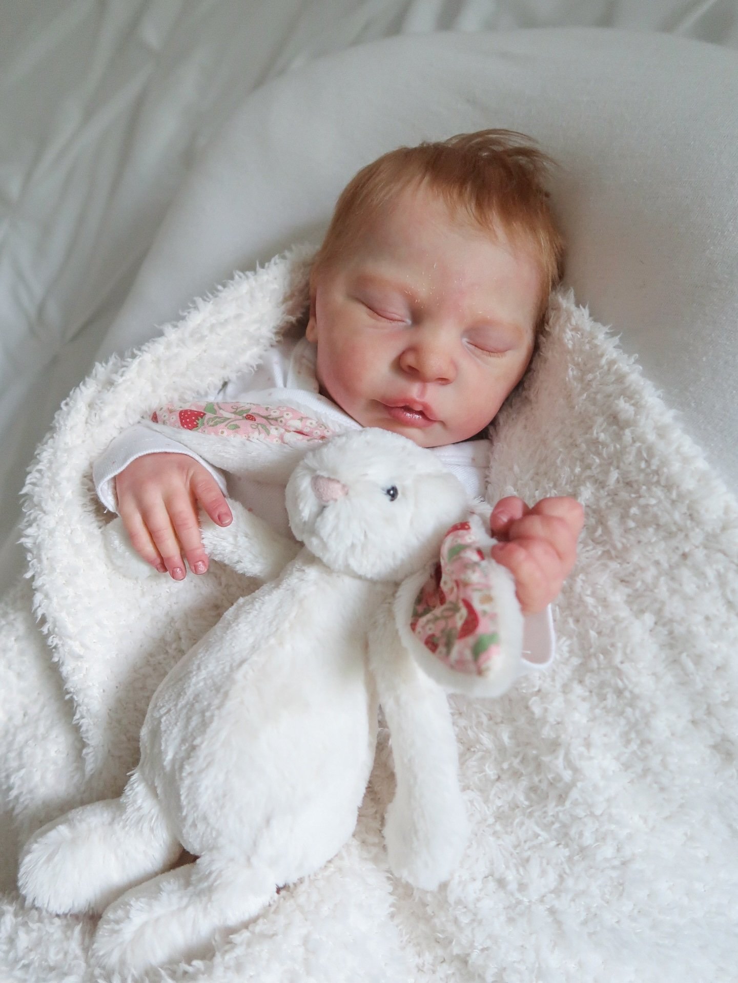 Mogle peaceful silicone reborn baby girl with lifelike details